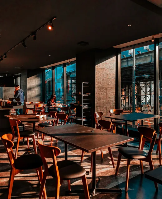 People conversing in a café